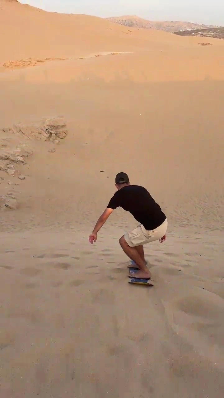 Sunset sandboarding adventure in Timlalin Desert near Agadir and Taghazout