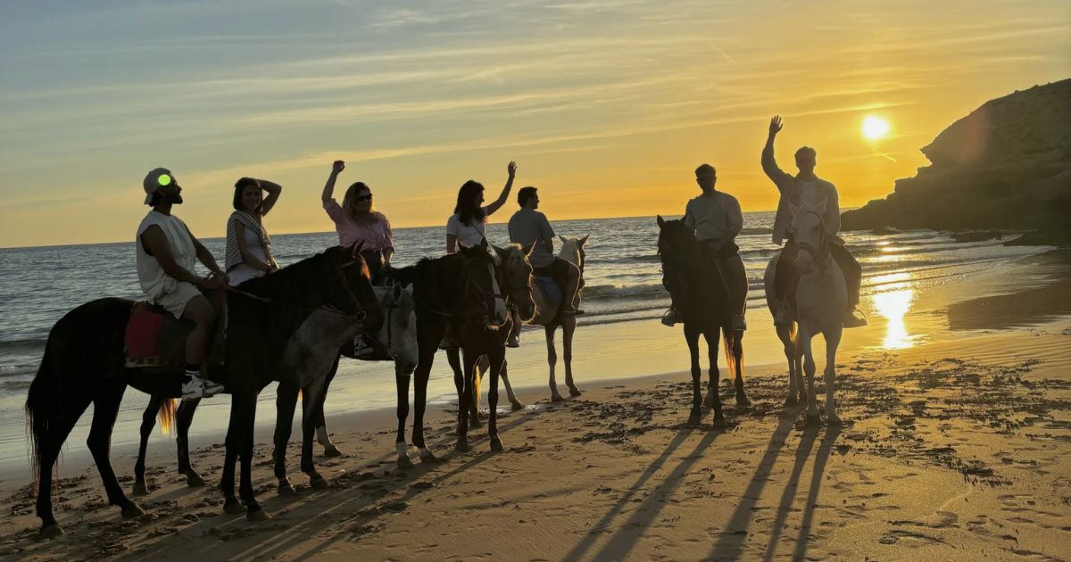 Sunset horse riding on Taghazout beach with Atlantic ocean views
